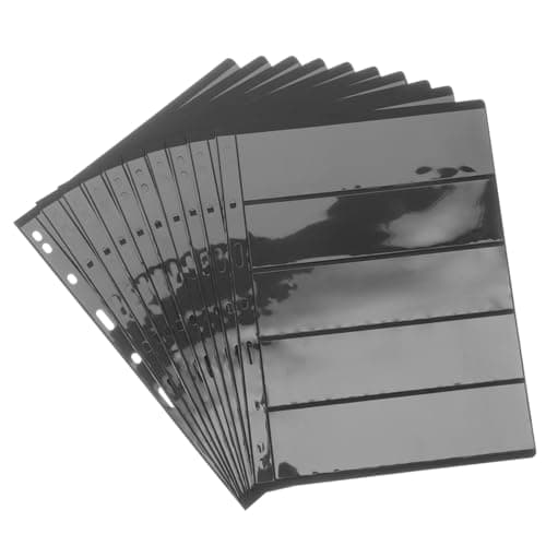 Álbum junto a una lupa de filatelia