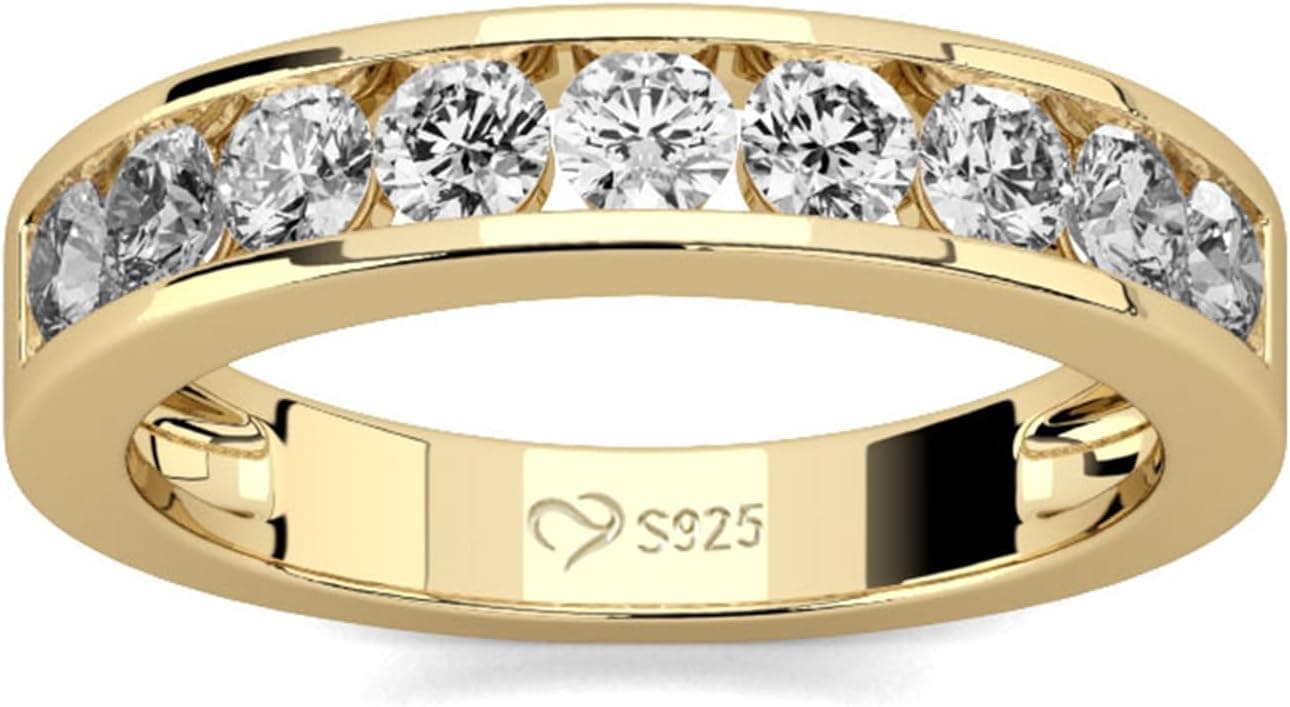 Anillo de compromiso fino con banda de circonitas ovaladas engastadas en canal y baño de oro amarillo