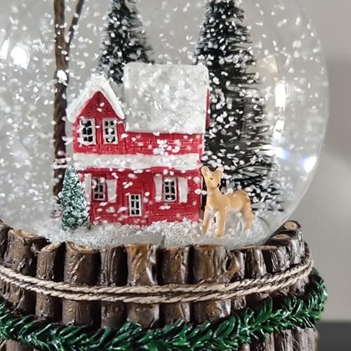 Detalle de la Bola de Nieve Musical Casa y Ciervos
