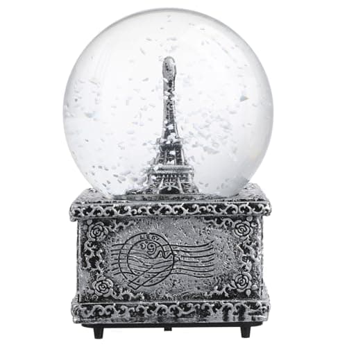 Bola de nieve retro con forma de la Torre Eiffel y copos de nieve dentro