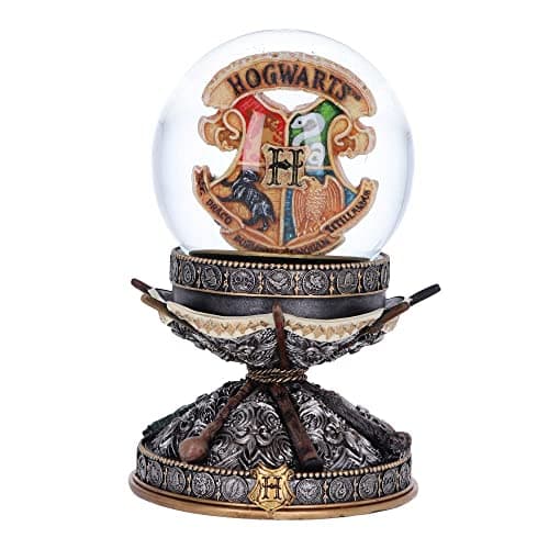 Bola de nieve con el escudo de Hogwarts y una base plateada con varitas cruzadas