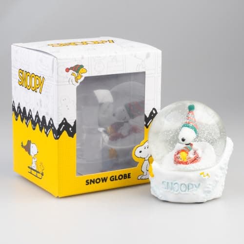 Bola de Nieve de Snoopy y Woodstock junto a su caja