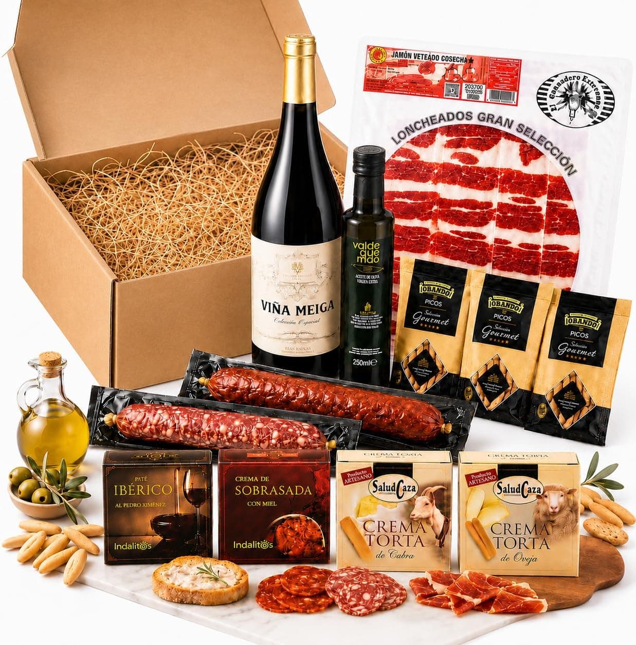 Cesta gourmet Acrol con jamón, vino tinto y quesos artesanos