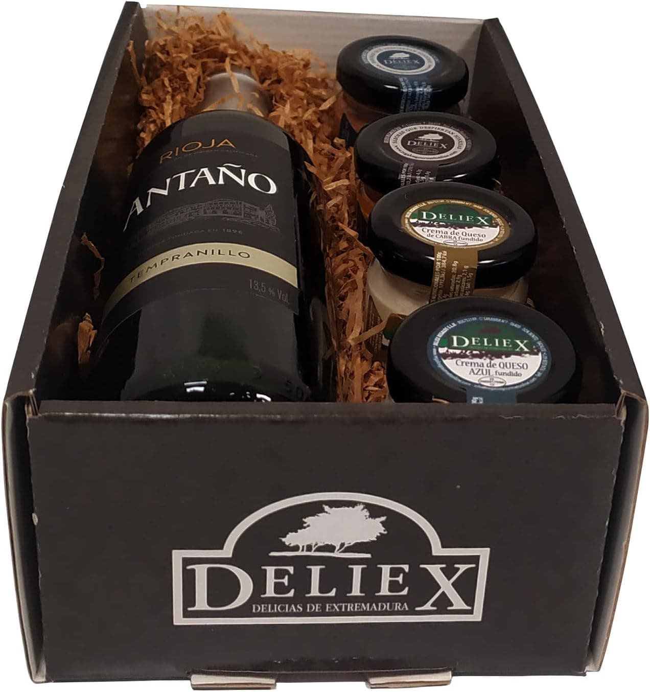 La botella de Rioja Antaño de pie con los cuatro tarritos de paté delante