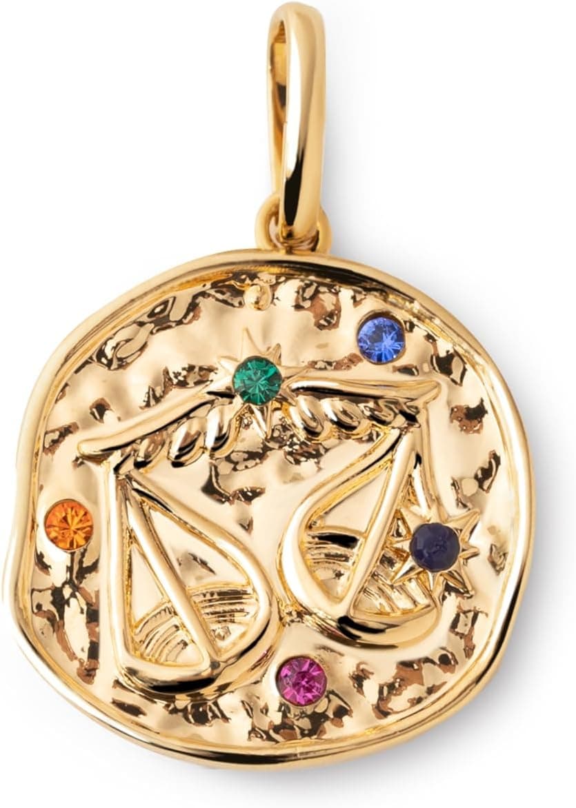 Charm dorado con el símbolo de la balanza de Libra y cuatro circonitas de colores