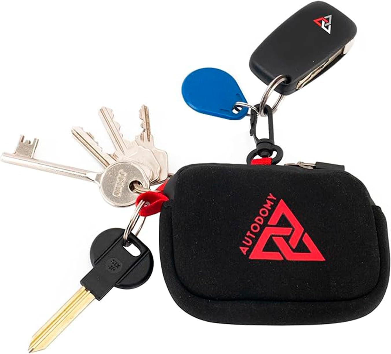 Estuche llavero negro y rojo de neopreno de Autodomy con mosquetón y llaves dentro