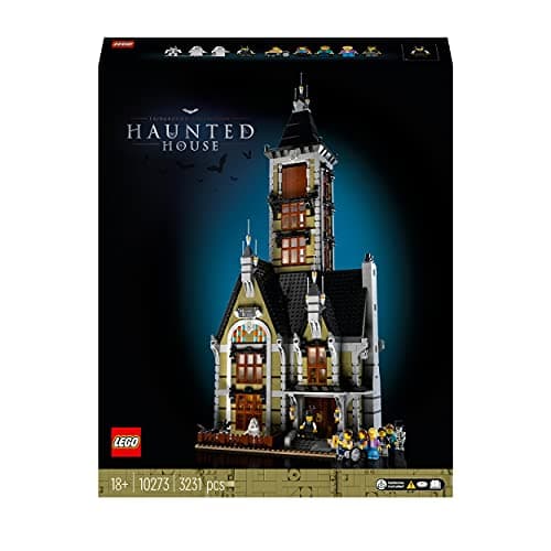 Maqueta LEGO de una casa encantada de feria con detalles de fantasmas