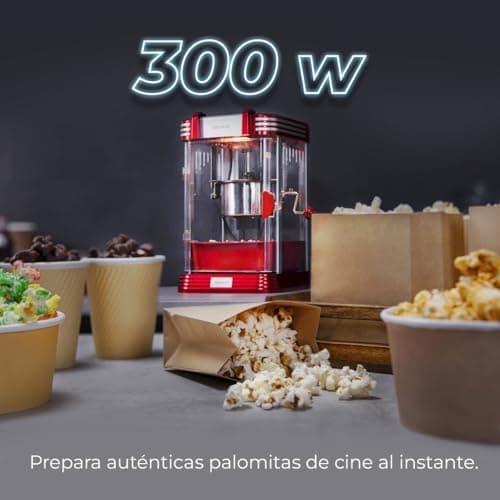 Máquina de palomitas Cecotec sobre una mesa con palomitas recién hechas alrededor