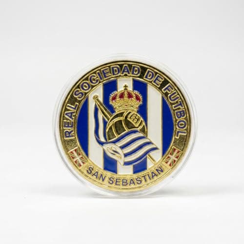 Reverso con el trofeo de la copa