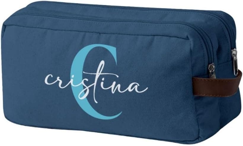 Neceser de canvas azul con inicial y nombre bordados, junto a otros colores disponibles