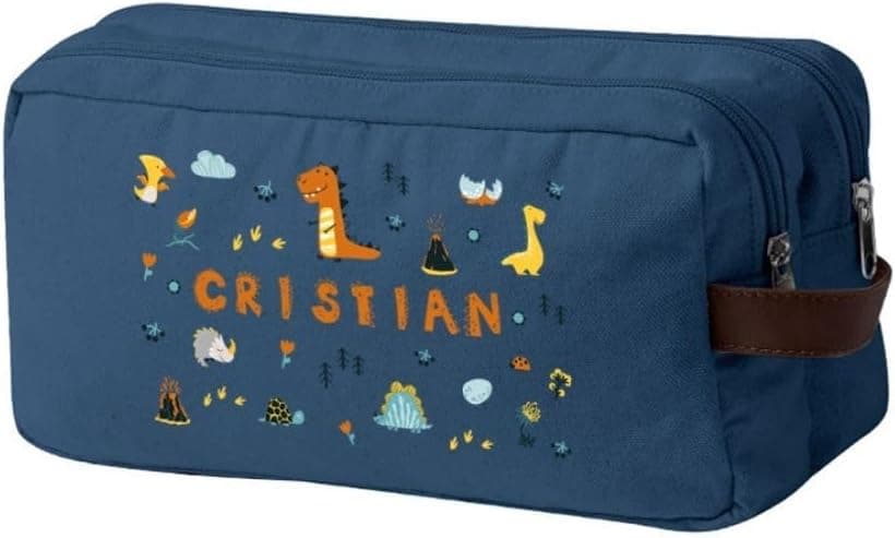 Neceser azul de canvas con dinosaurios bordados y el nombre del niño