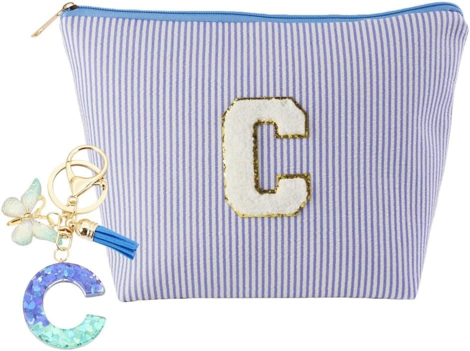 Neceser de rayas azules con llavero de mariposa e inicial, de MHwan