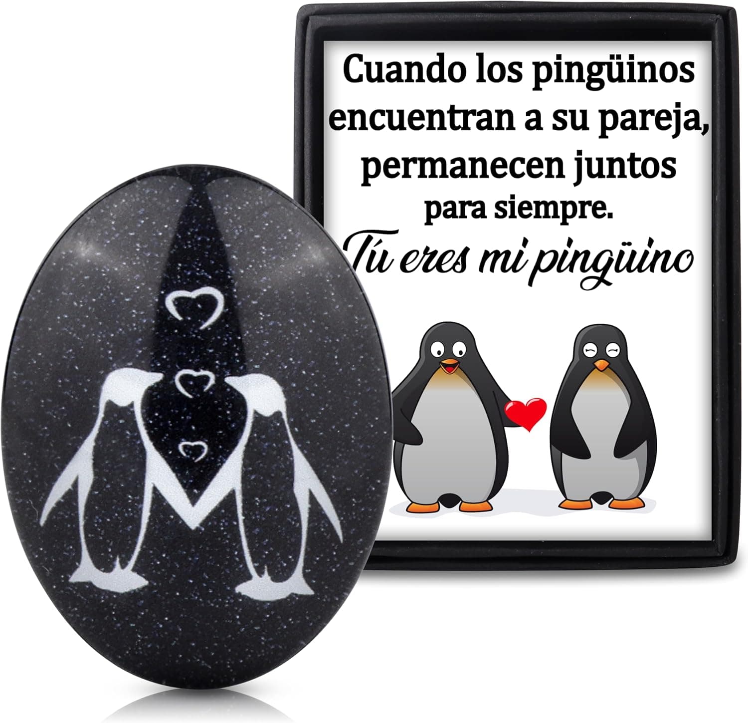 Piedra decorativa con la figura de dos pingüinos grabada