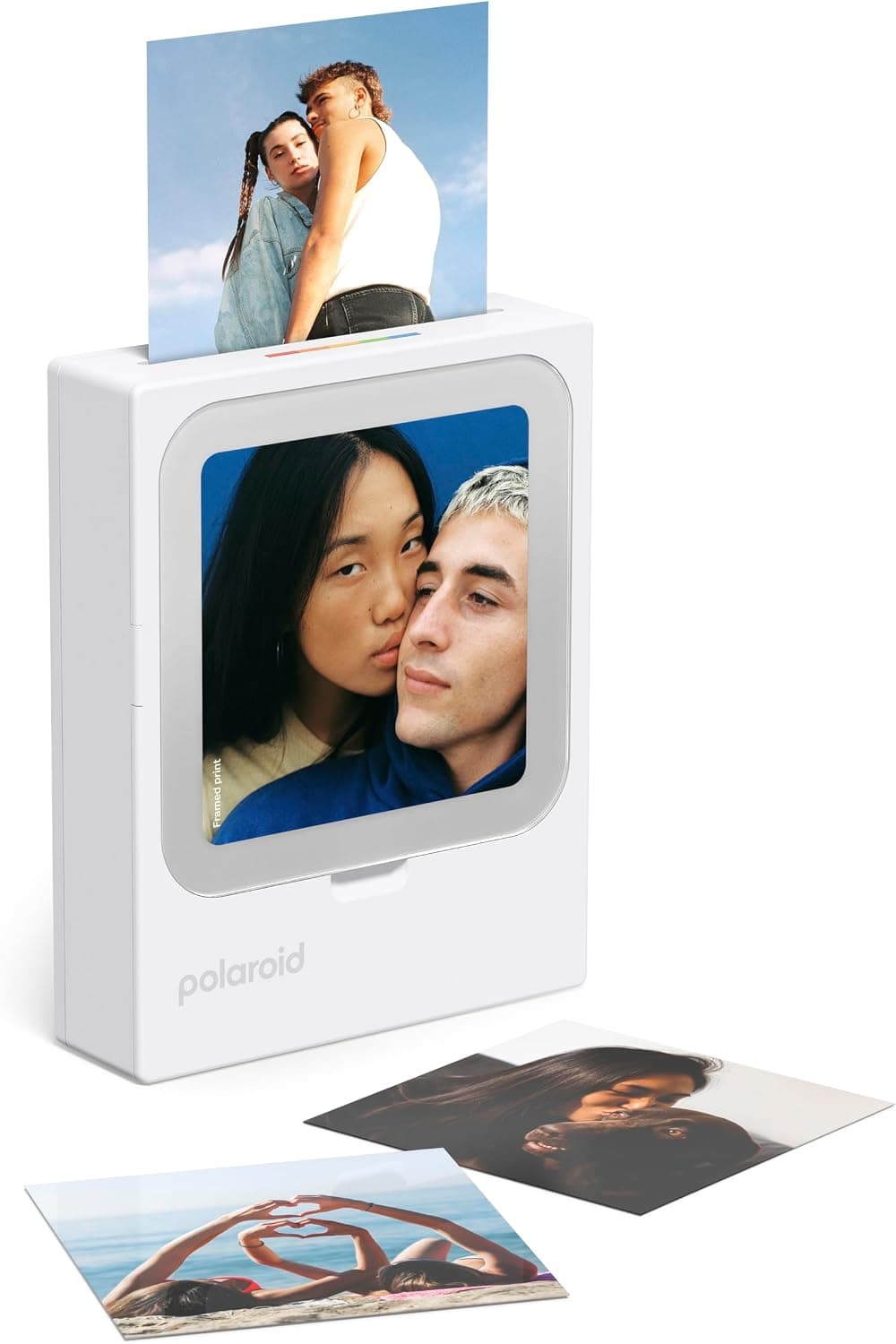 La impresora blanca Polaroid Hi-Print 3x3 con una foto asomando por la ranura superior