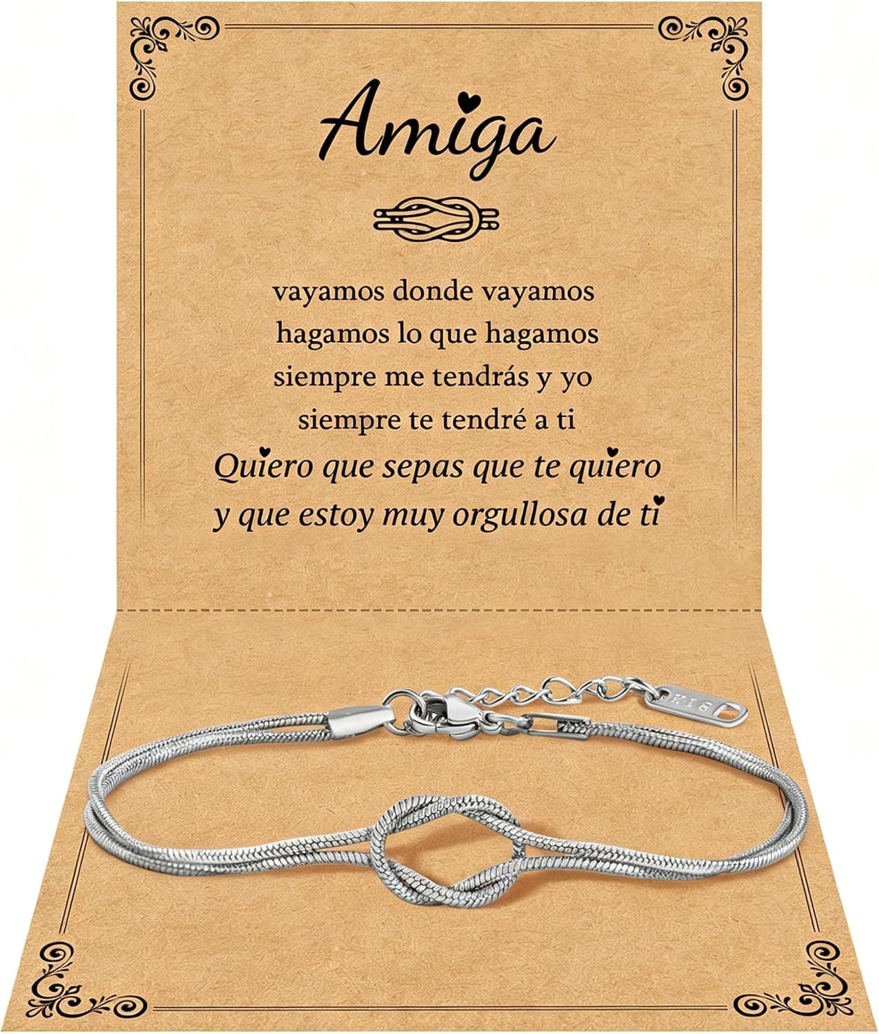 Pulsera de cadena fina con un nudo central en tono plateado, presentada abierta sobre una tarjeta de dedicatoria con el texto "Amiga"