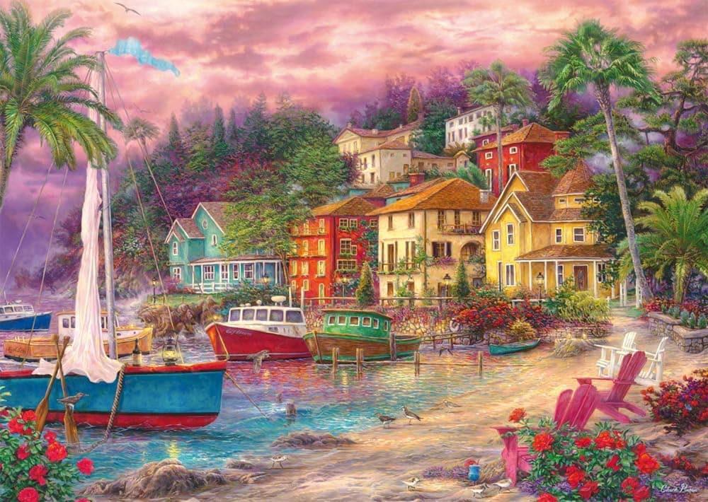 La caja del puzzle de Schmidt con la ilustración costera «Coastal Magic» de Chuck Pinson