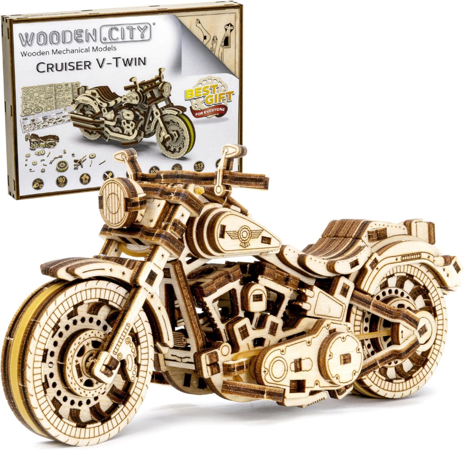 Maqueta de madera de una moto cruiser V-Twin montada, con piezas mecánicas visibles
