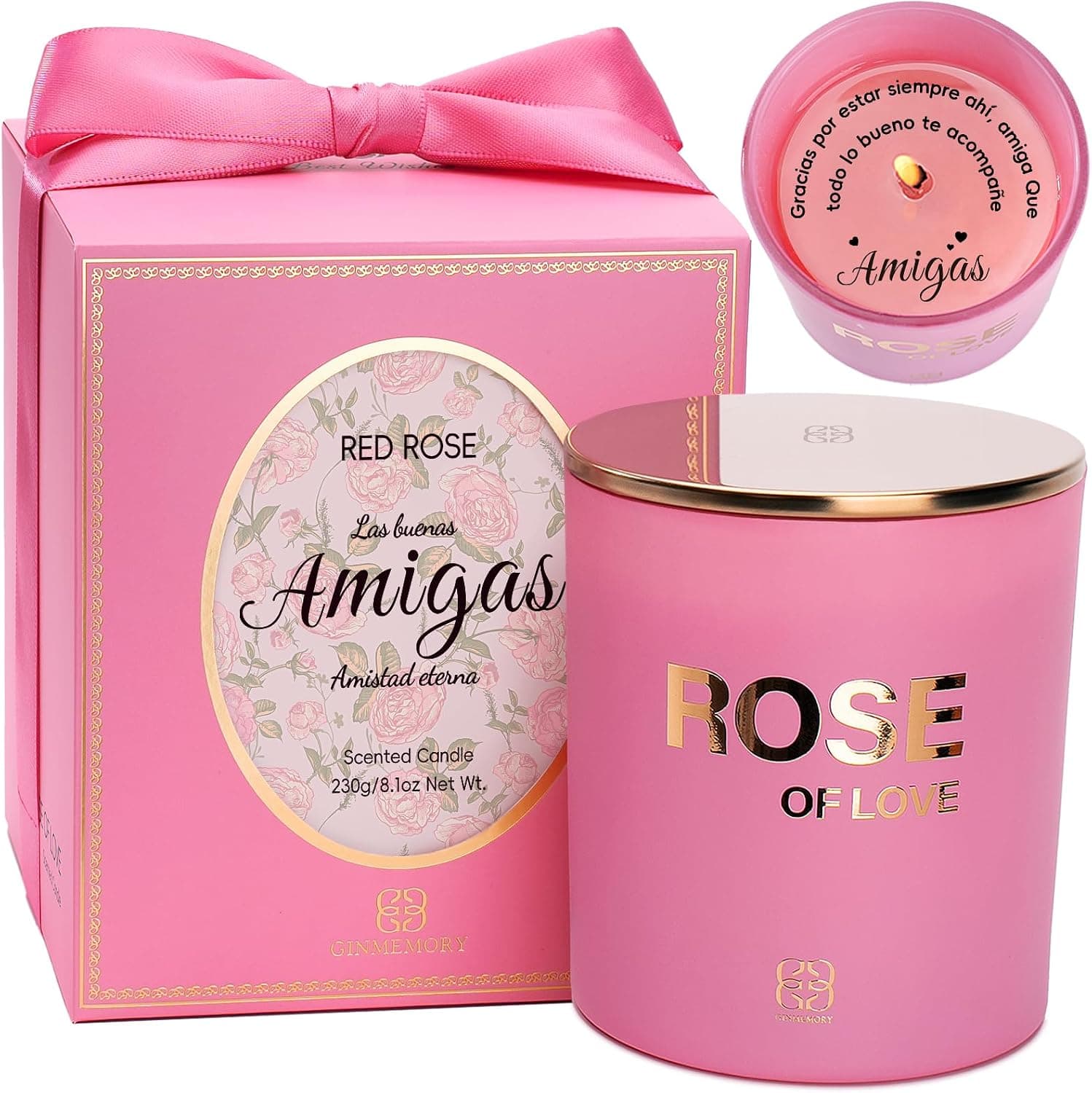 Vela aromática rosa en tarro de cristal con la palabra "Rose" grabada, junto a la caja de regalo a juego con lazo de raso y un mensaje de amistad