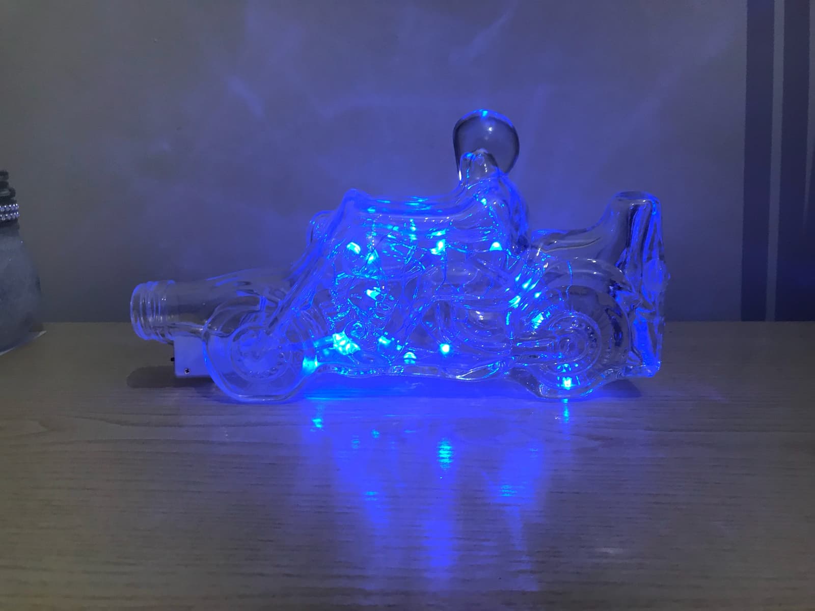 Botella luminosa con forma de moto