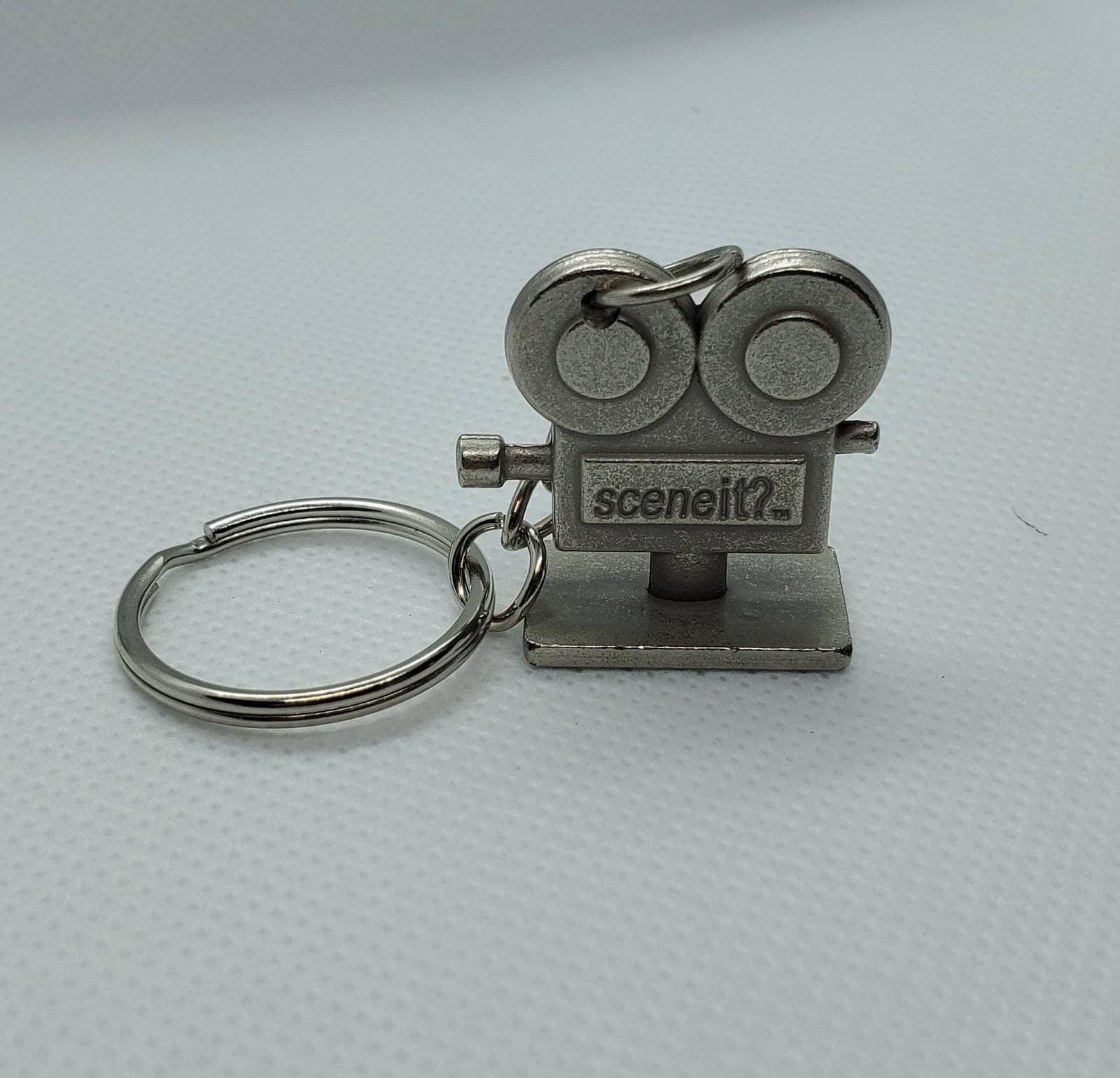 Llavero de fichas de cine recicladas, foto 2