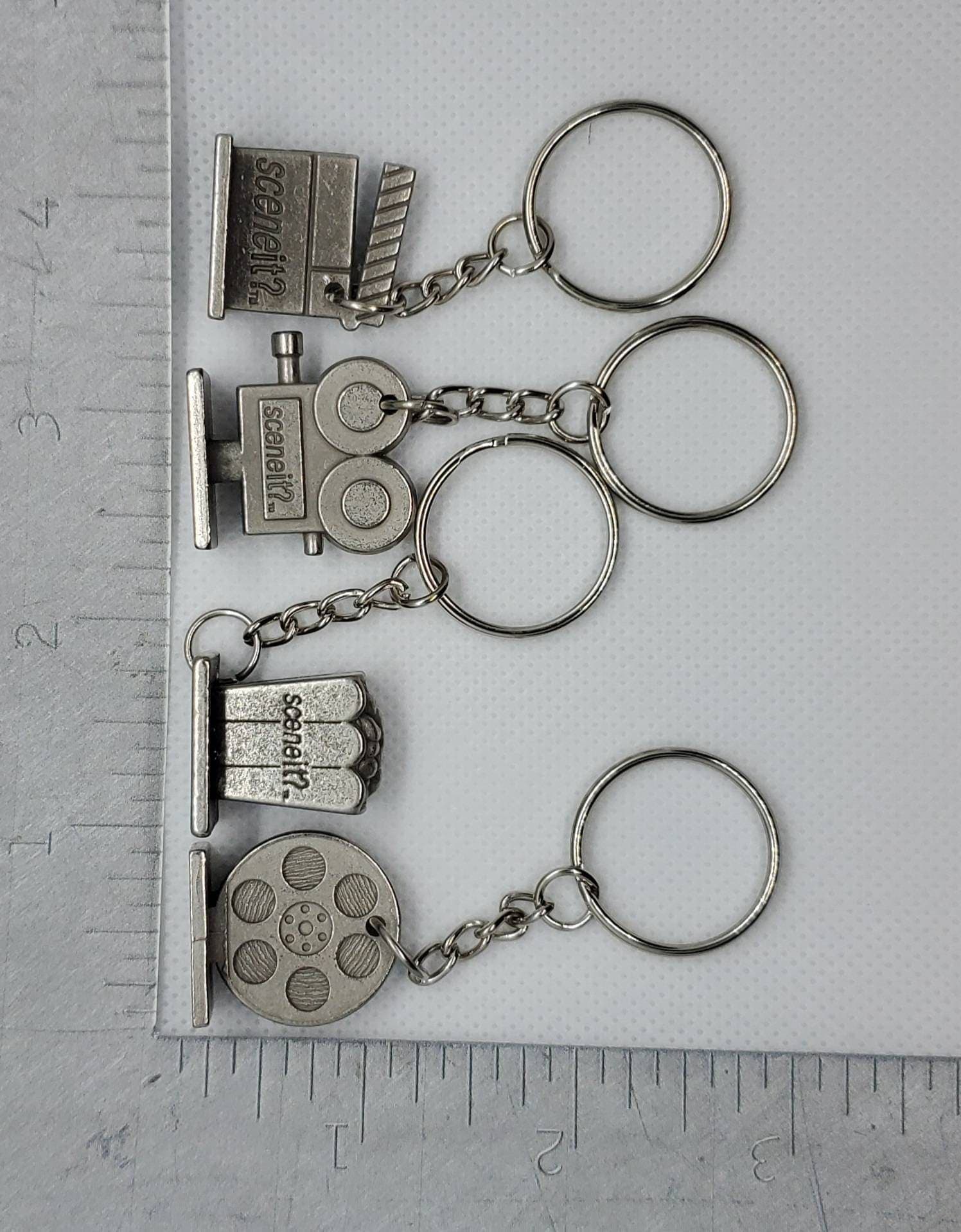 Llavero de fichas de cine recicladas, foto 6