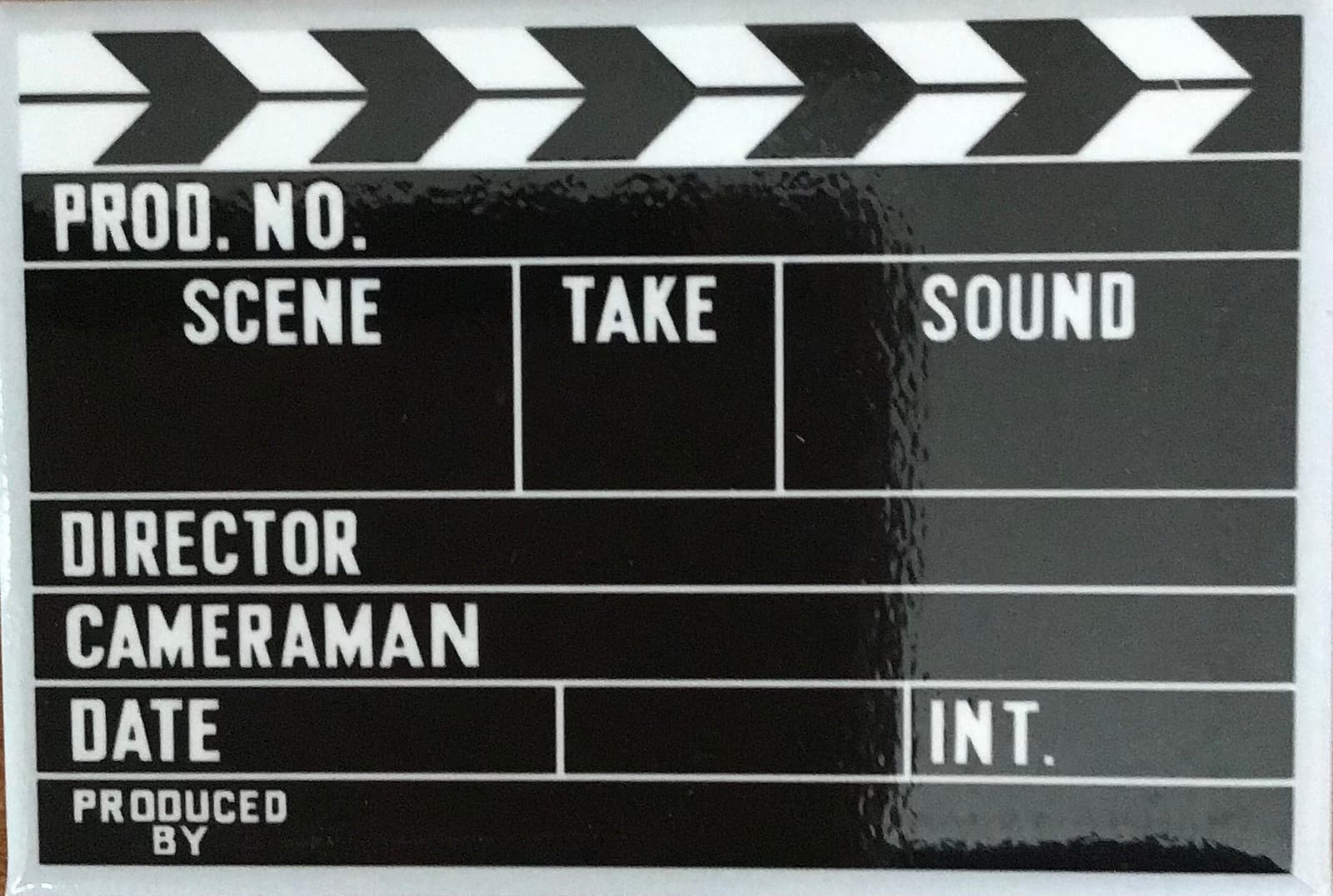 Imán de nevera con diseño de claqueta de cine