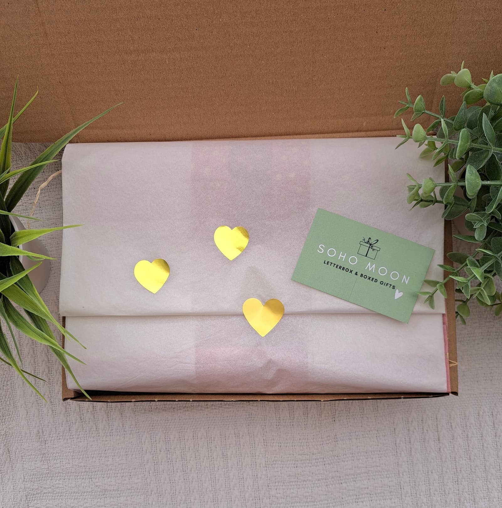 All beautifully wrapped in tissue paper