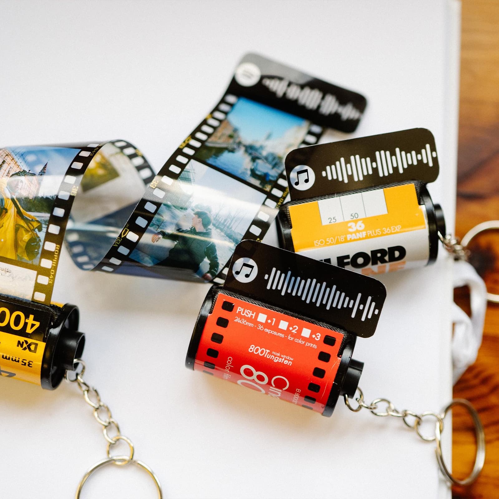 Llavero carrete de fotos y música personalizado