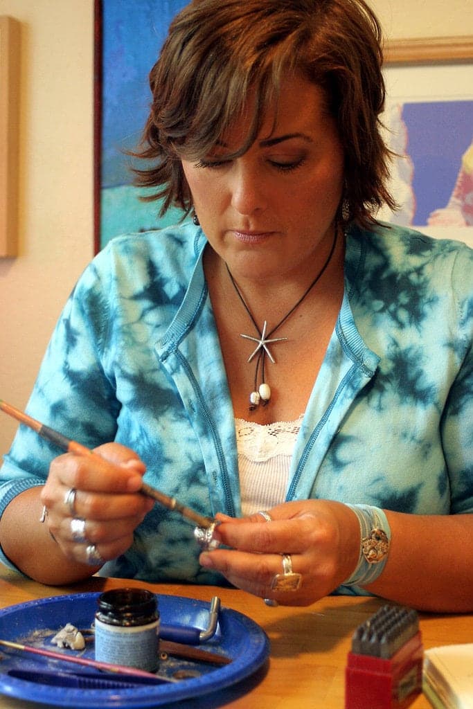 Licky Drake, an Etsy artist, creating sterling silver jewelry in her Kentucky studio.,