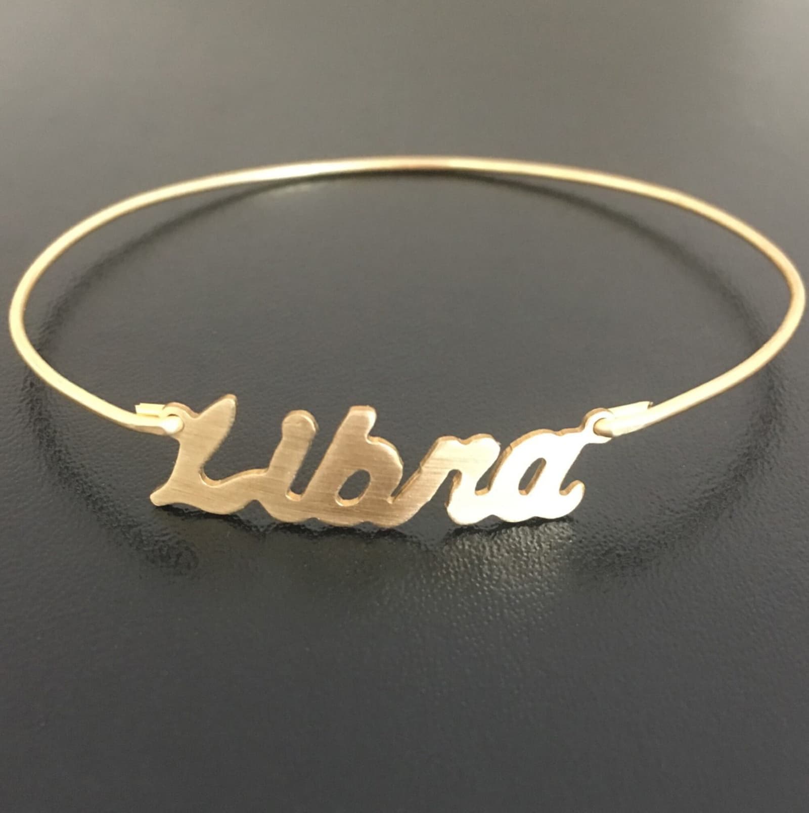 Pulsera rígida fina con signo del zodíaco, foto 4