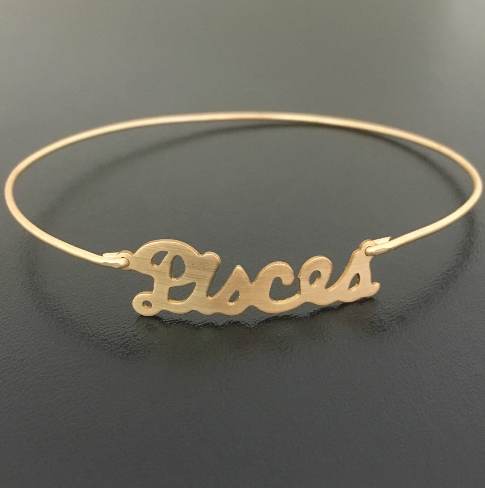 Pulsera rígida fina con signo del zodíaco, foto 8