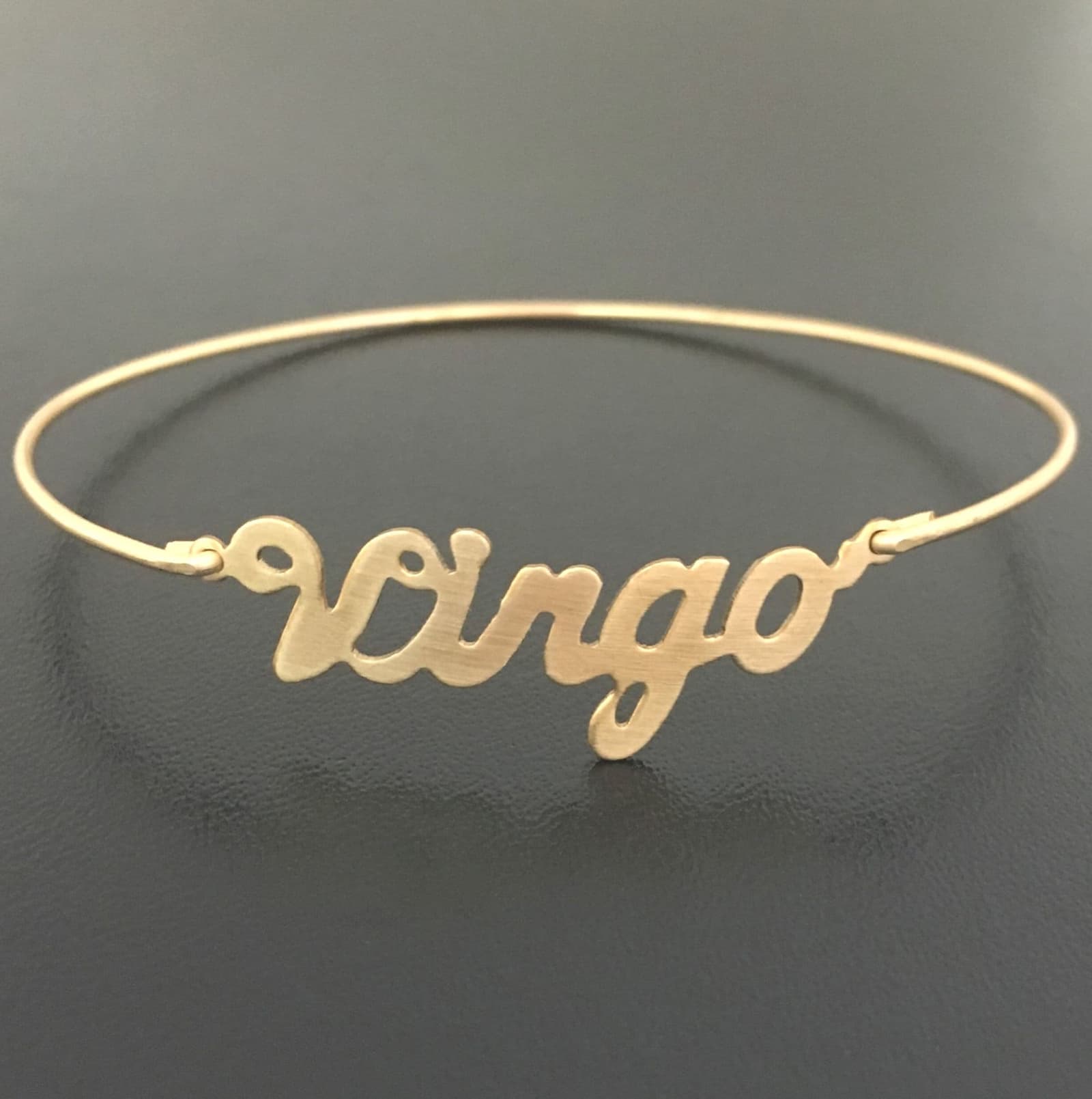 Pulsera rígida fina con signo del zodíaco, foto 3