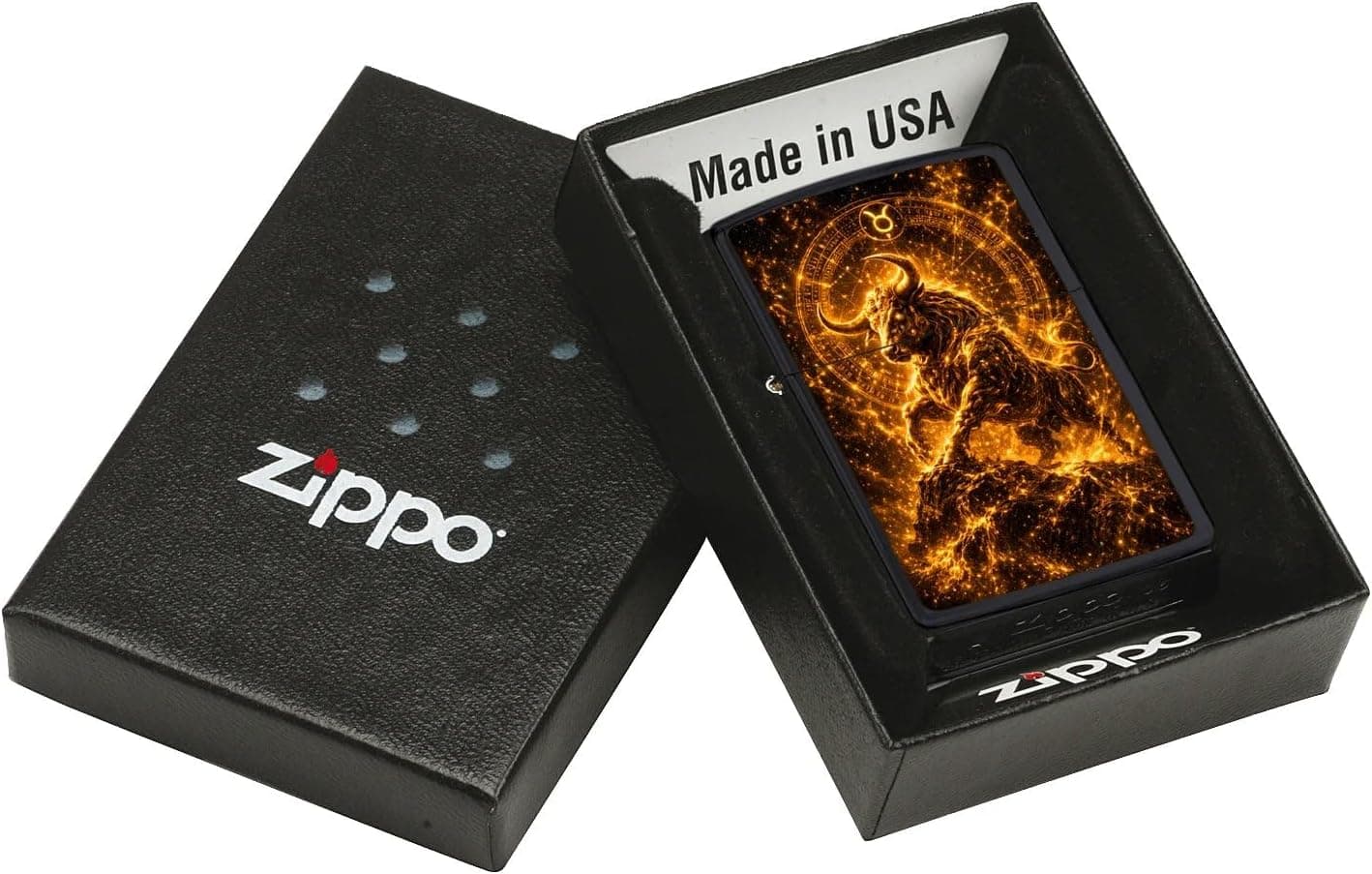 Mechero Zippo negro y dorado con el signo de Tauro grabado