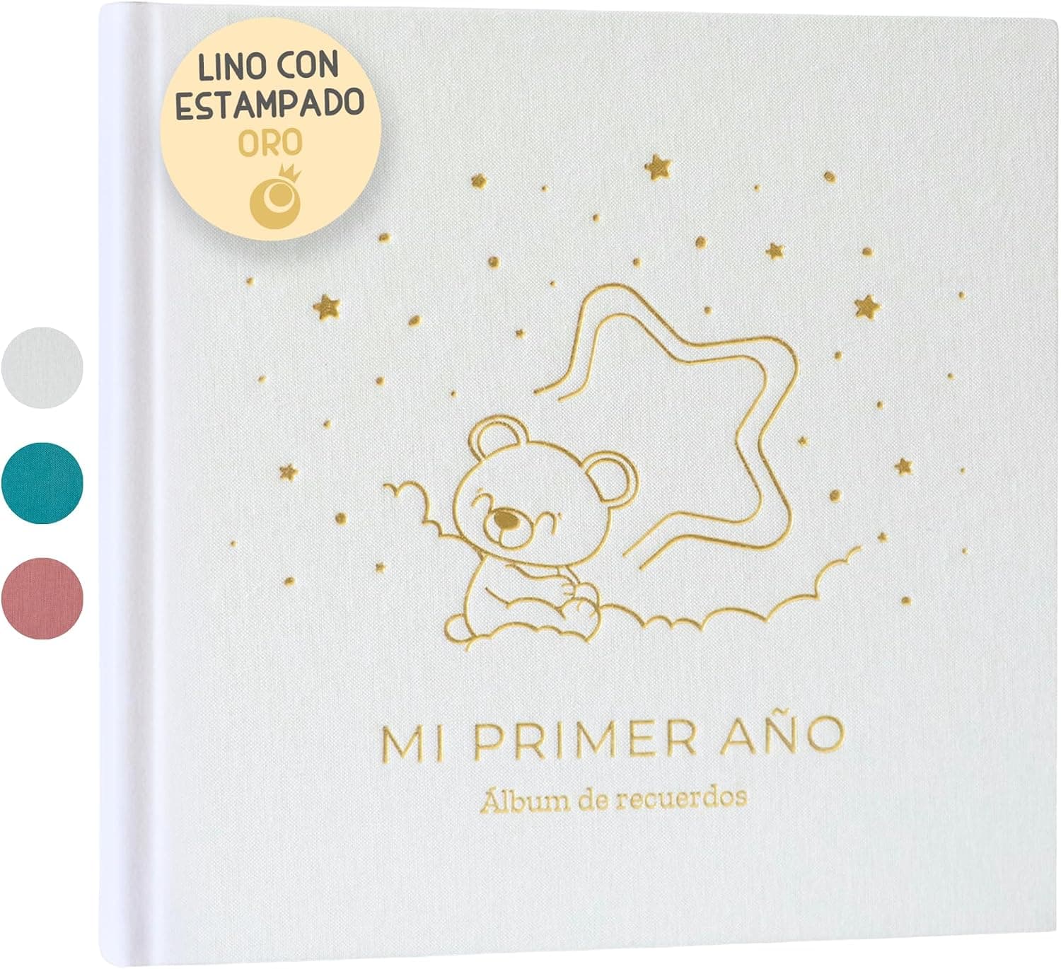Álbum con portada de lino blanco, un osito y estrellas grabados en oro, y el texto «Mi Primer Año, Álbum de Recuerdos»
