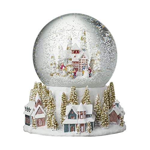Globo de nieve grande con un paisaje alpino nevado, sobre base decorativa