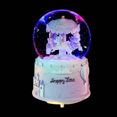 Bola de nieve con un unicornio girando en un carrusel de luces
