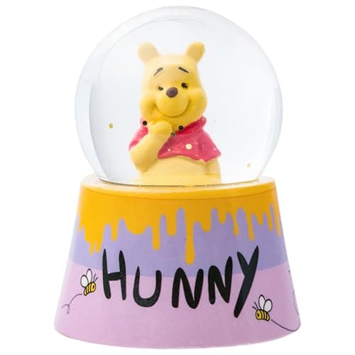 Bola de nieve iluminada de Winnie the Pooh sentado sobre un tarro de miel