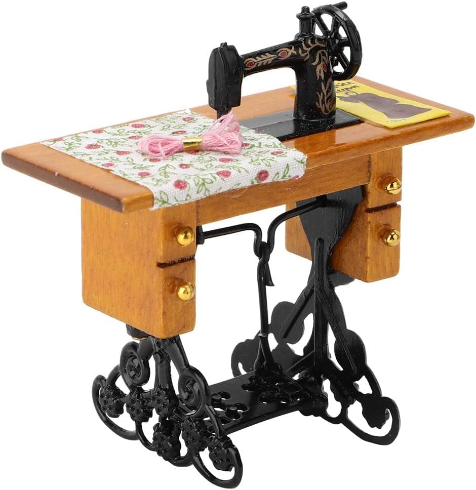 Caja de música en miniatura con forma de máquina de coser antigua
