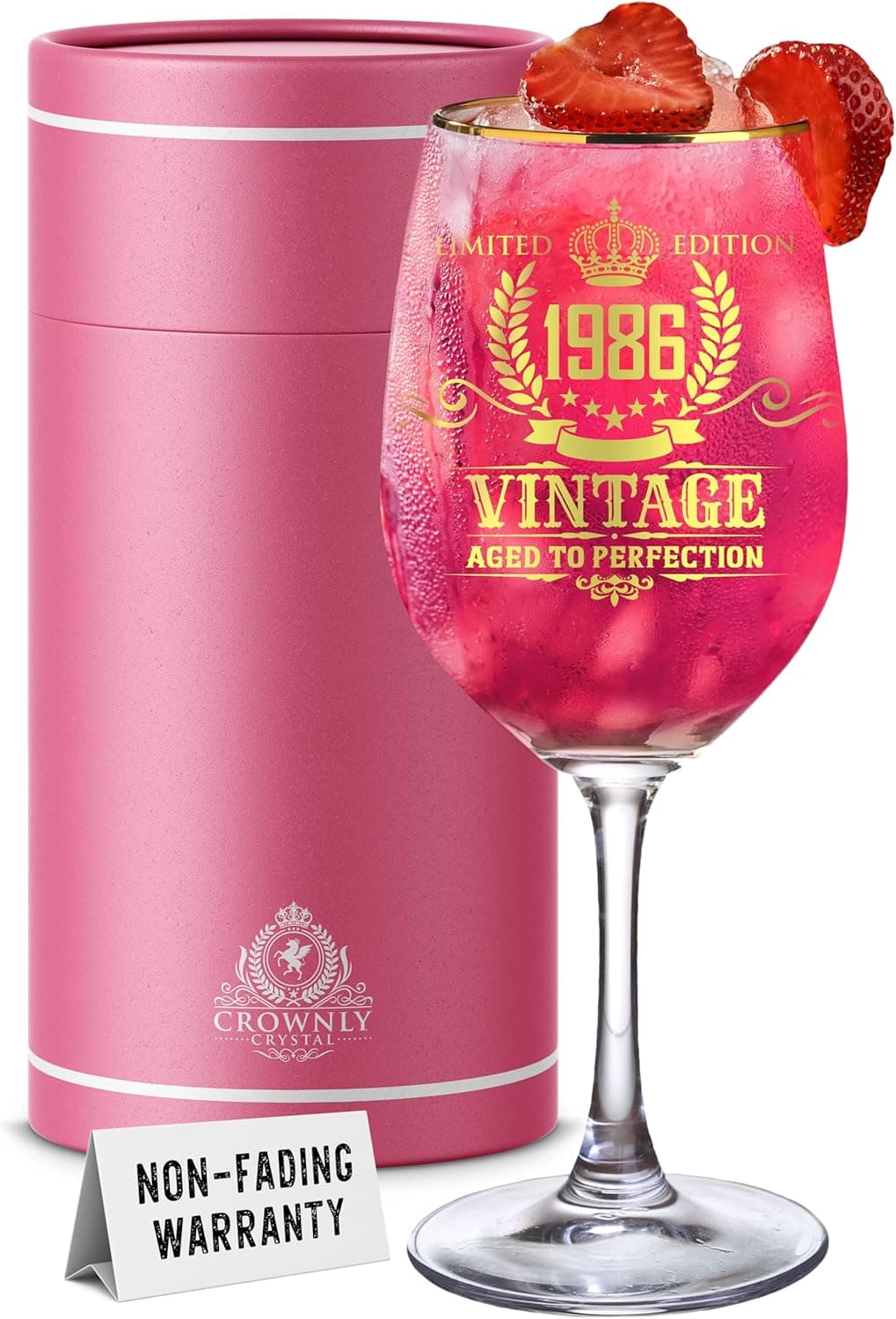 La copa de cristal grabada con el año 1986 y el texto Vintage Aged to Perfection, junto a su estuche cilíndrico rosa
