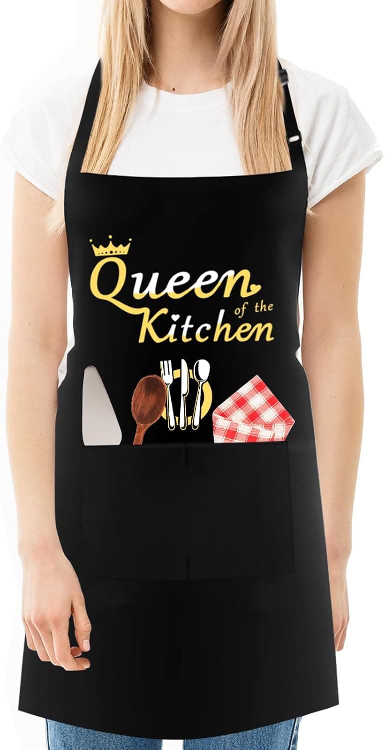 Delantal negro con el mensaje Cocina de la Reina