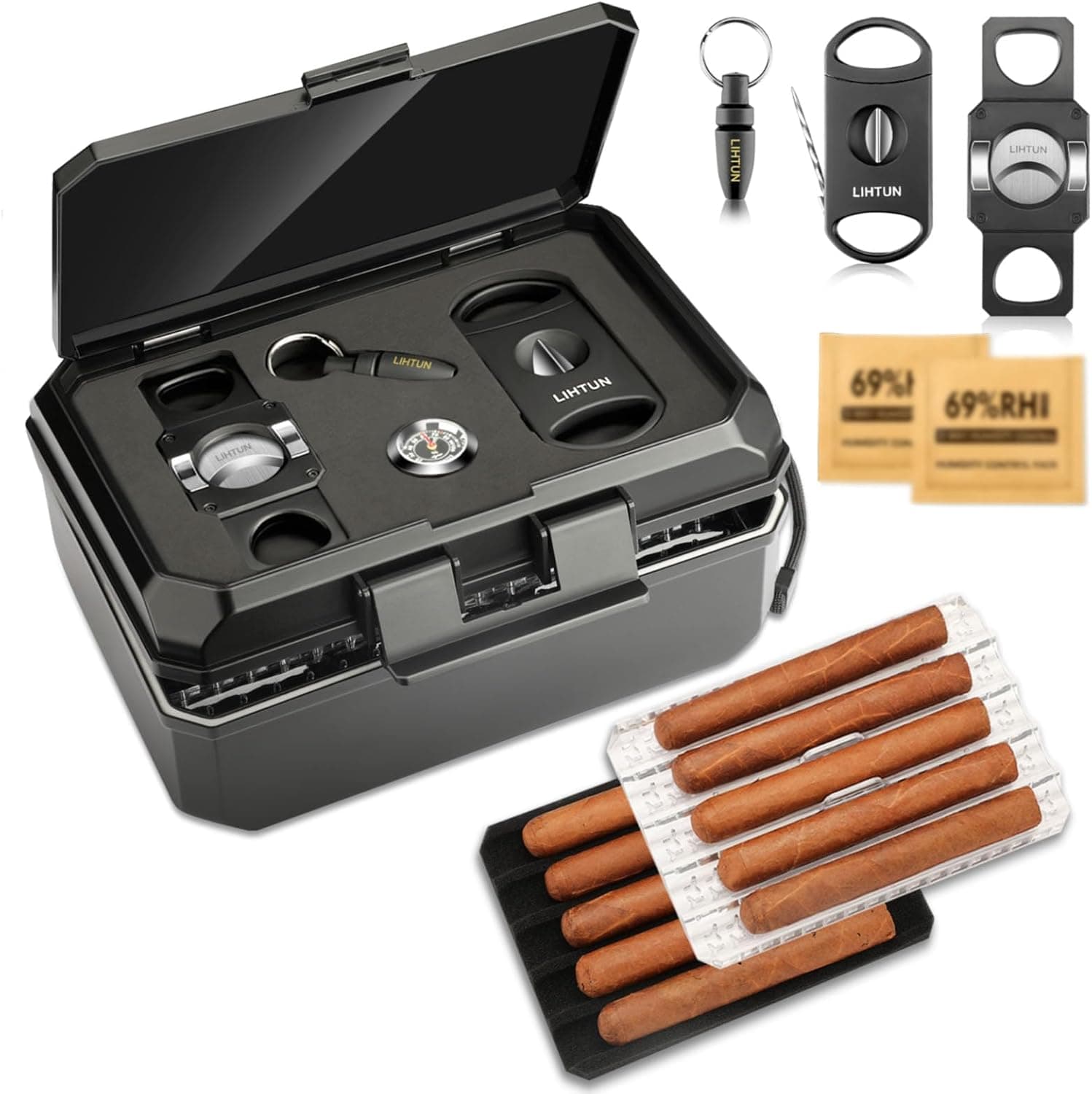 Estuche humidor abierto con los cortapuros y el higrómetro en la bandeja superior