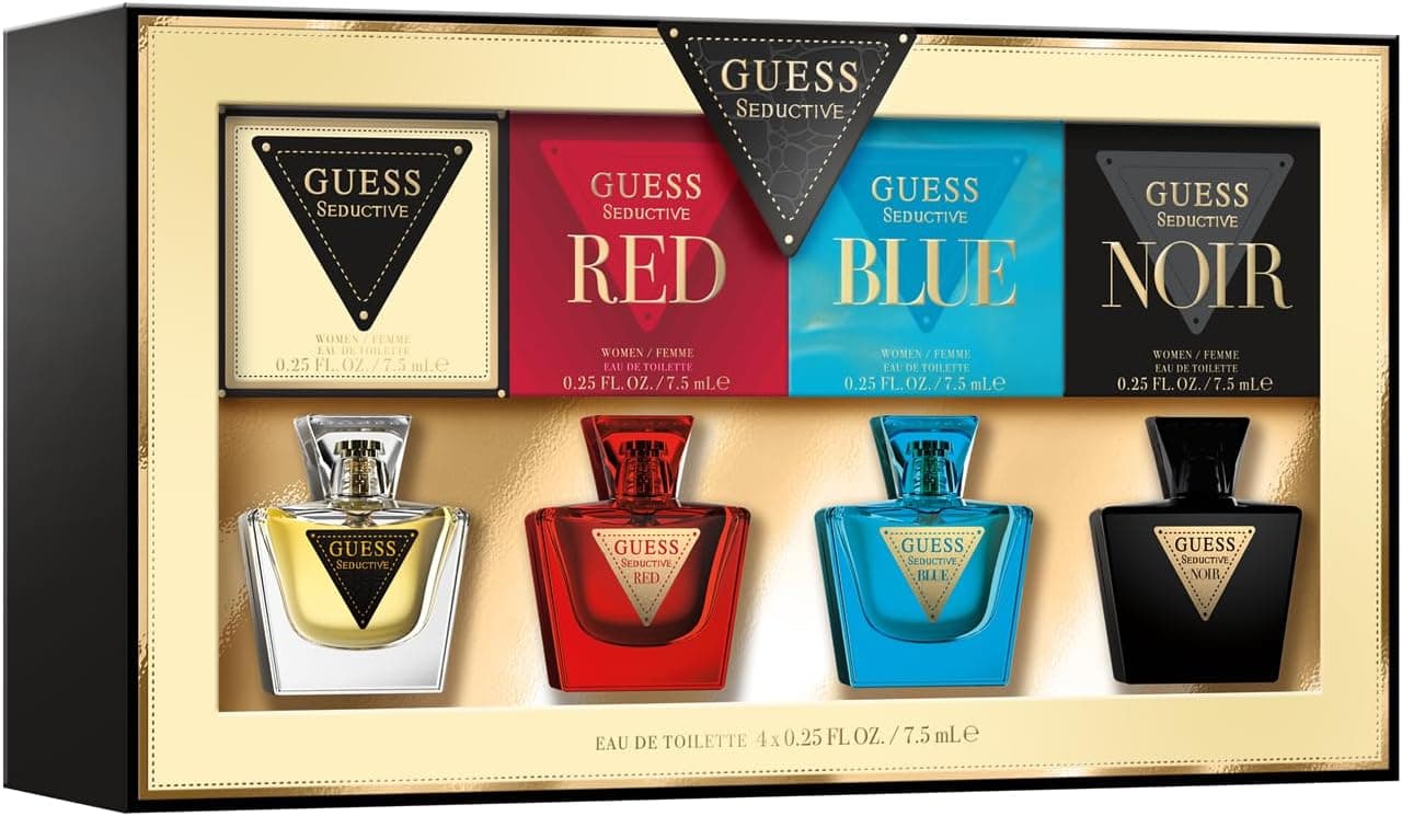 El estuche dorado abierto con los cuatro frascos pequeños de Guess Seductive: el transparente, el rojo, el azul y el negro