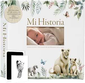 Álbum de recuerdos del bebé con tapa dorada y hueco para la fotografía en portada