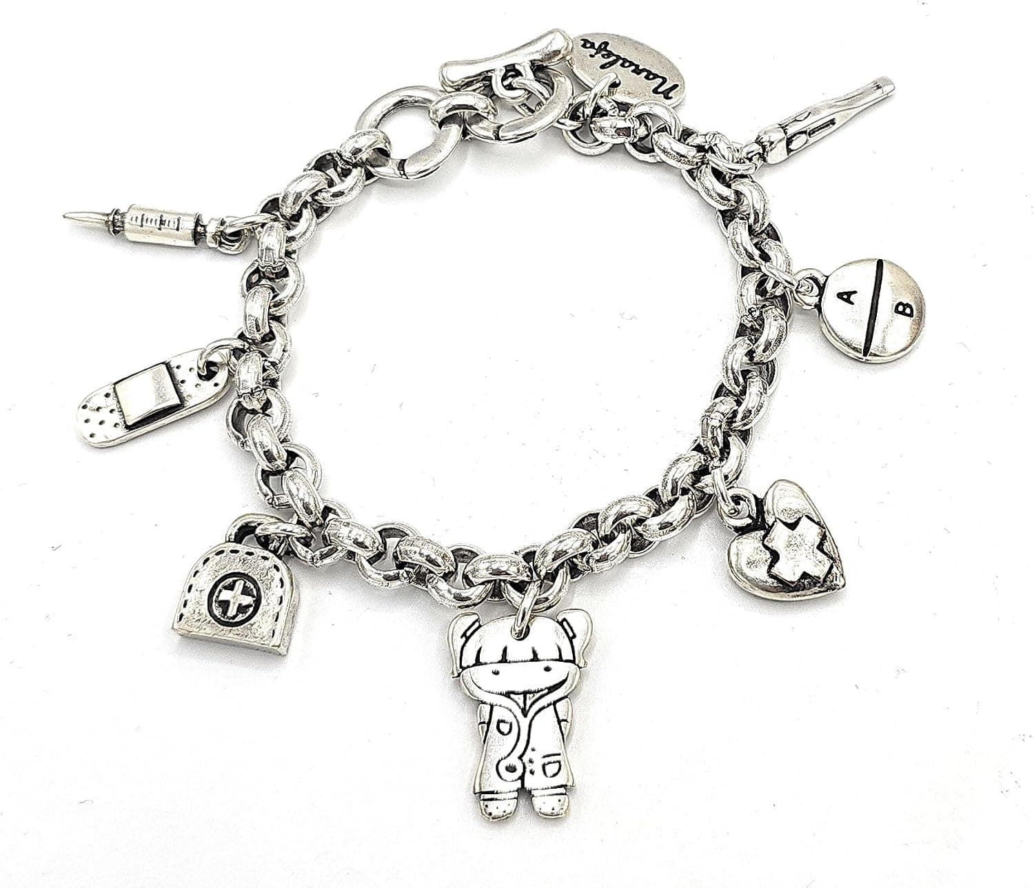 Pulsera con siete charms de temática sanitaria, bañada en plata