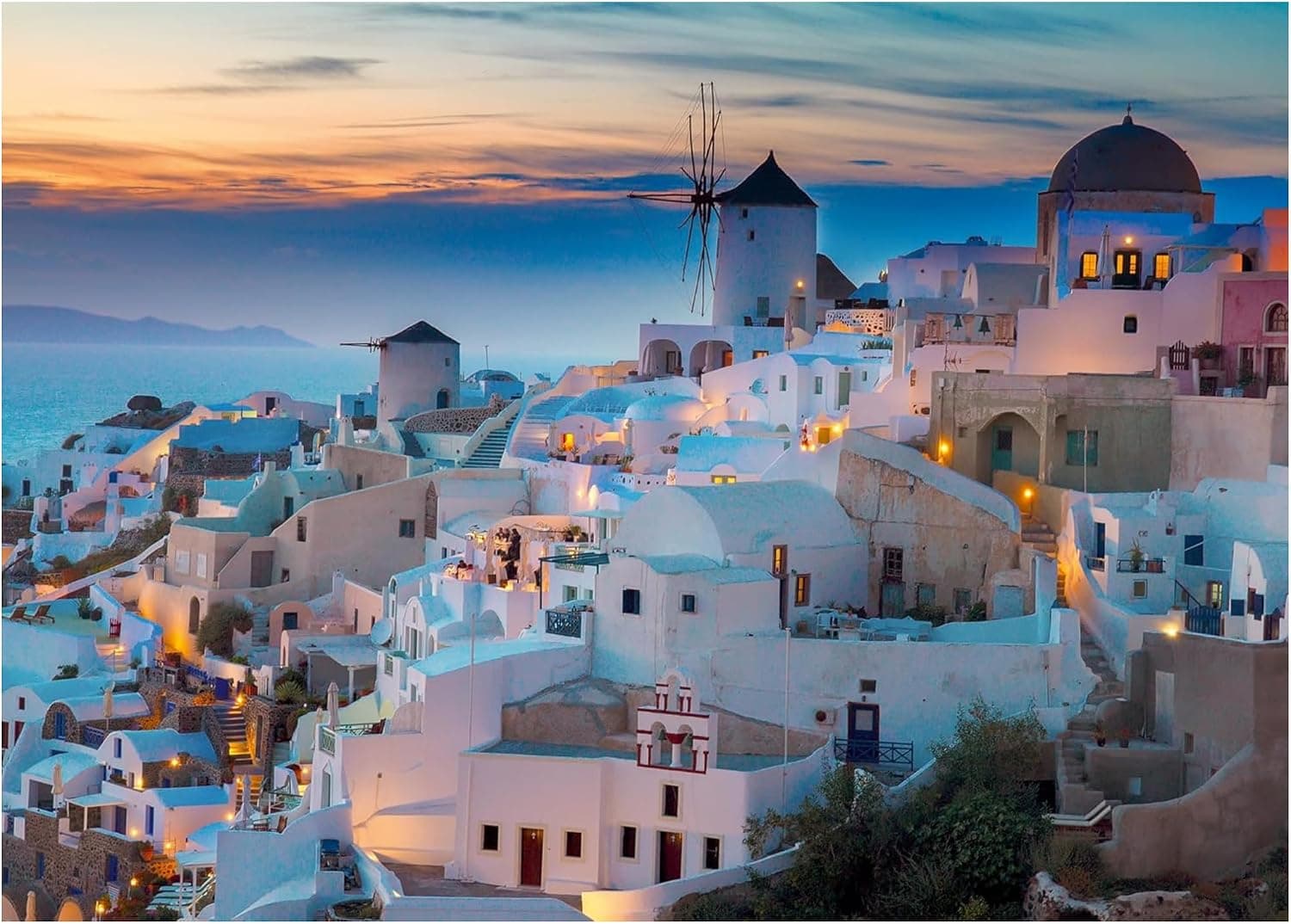 Puzzle montado con las casas blancas y las cúpulas azules de Santorini sobre el mar Egeo