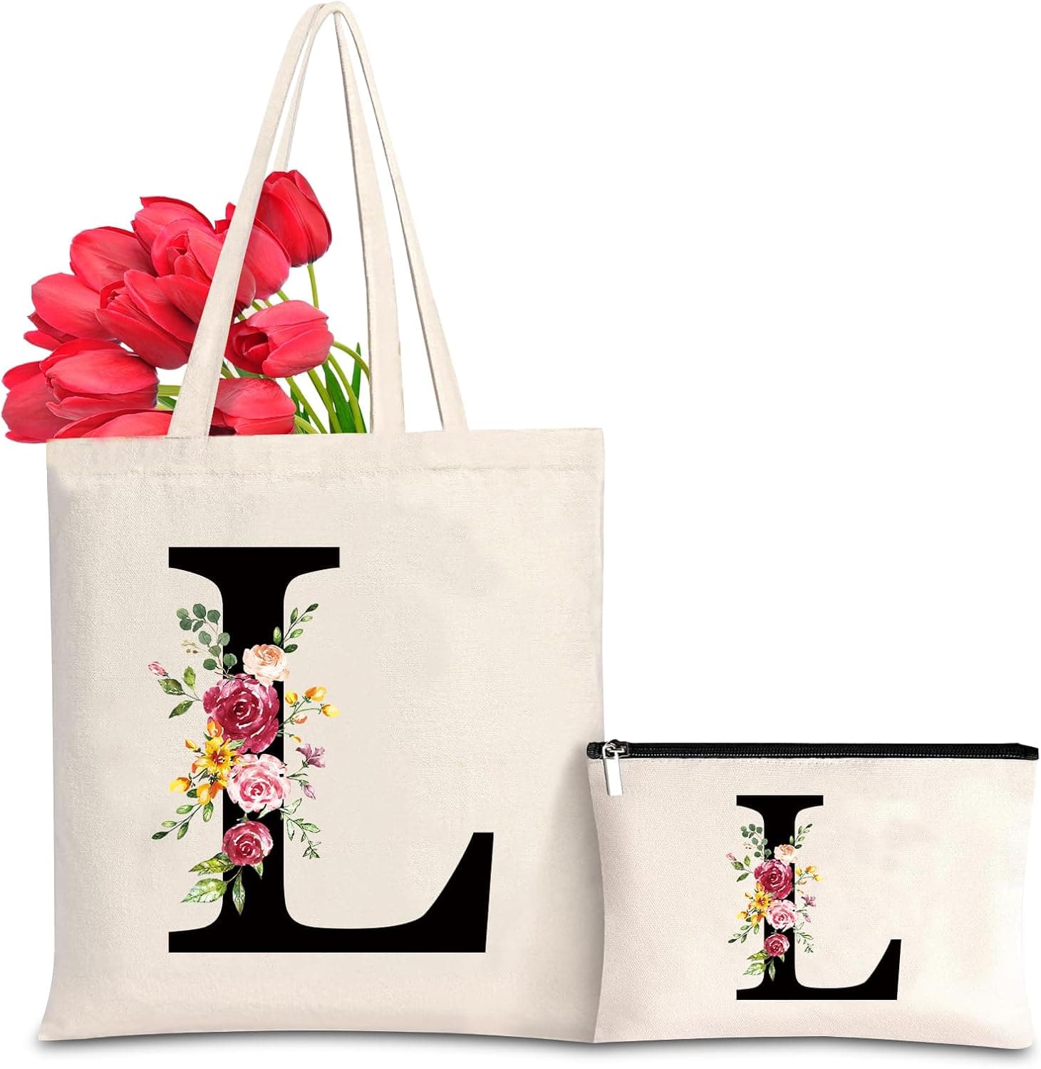 Bolso tote de lona con la letra L decorada con flores rosas, junto a un neceser a juego con el mismo diseño